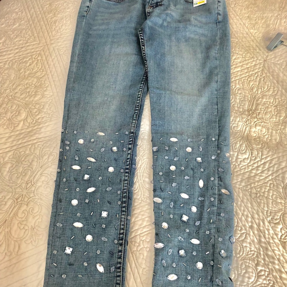 Studded, straight leg jean.  Size 6.